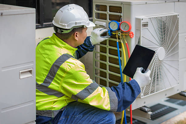Professional Air Conditioning Repair technician working in Mexico, NY